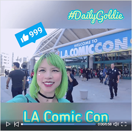 Toto je snímka obrazovky videa Goldie Chan LinkedIn so štartovacou obrazovkou. Video bolo natočené vodorovne na smartphone a zmenilo sa na štvorcové video s rozmazaným letterboxom nad a pod videom. Na úvodnom videu je Goldie pred kongresovým centrom pre LA Comic Con. Goldie sa objaví od pliec nahor. Je to ázijská žena so zelenými vlasmi. Má na sebe mejkap, čierny náhrdelník s obojkom a tyrkysovú košeľu. V oblasti poštových schránok nad videom sa #DailyGoldie zobrazuje svetlozeleným písmom so tyrkysovým obrysom. Ikona LinkedIn Like s číslom 999 sa zobrazí v modrom poli nad hlavou Goldie. V oblasti poštových schránok pod videom sa text „LA Comic Con“ zobrazuje svetlozeleným písmom san serif s tyrkysovým obrysom.