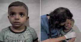Lekár sa takto snažil upokojiť palestínske dieťa, ktoré sa triaslo od strachu počas izraelského útoku