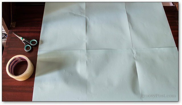 papiere zošité spolu s lepiacou páskou na pozadí zlepšujú prednú časť