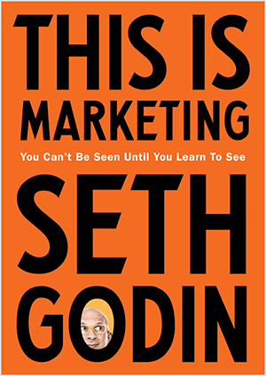 Toto je snímka obrazovky z obalu filmu This Is Marketing od Setha Godina. Obal je zvislý obdĺžnik s oranžovým pozadím a čiernym textom. V poli jeho priezviska sa objaví fotografia Sethovej hlavy.